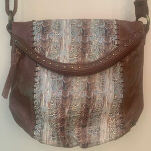 The Sak animal print/dark tan genuine leather crossbody bag